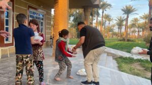 Charity 64 - Iftar charity in the widows' nighbothood, Saqlawiyah, Iraq