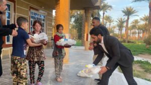 Charity 64 - Iftar charity in the widows' nighbothood, Saqlawiyah, Iraq